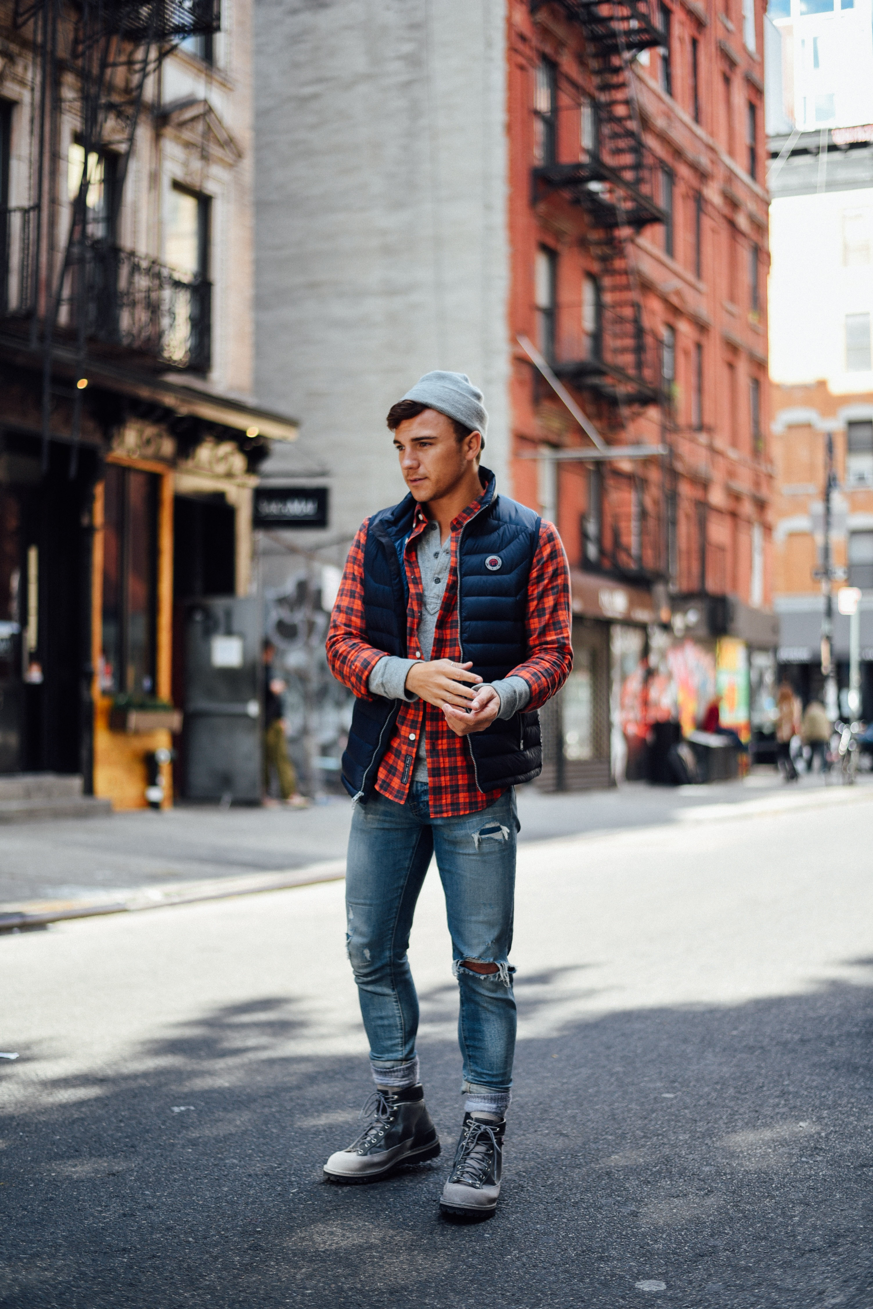 Men's Fashion Blogger Justin Livingston wears Abercrombie Men's Denim Plaid Shirt Puffer Vest in New York City