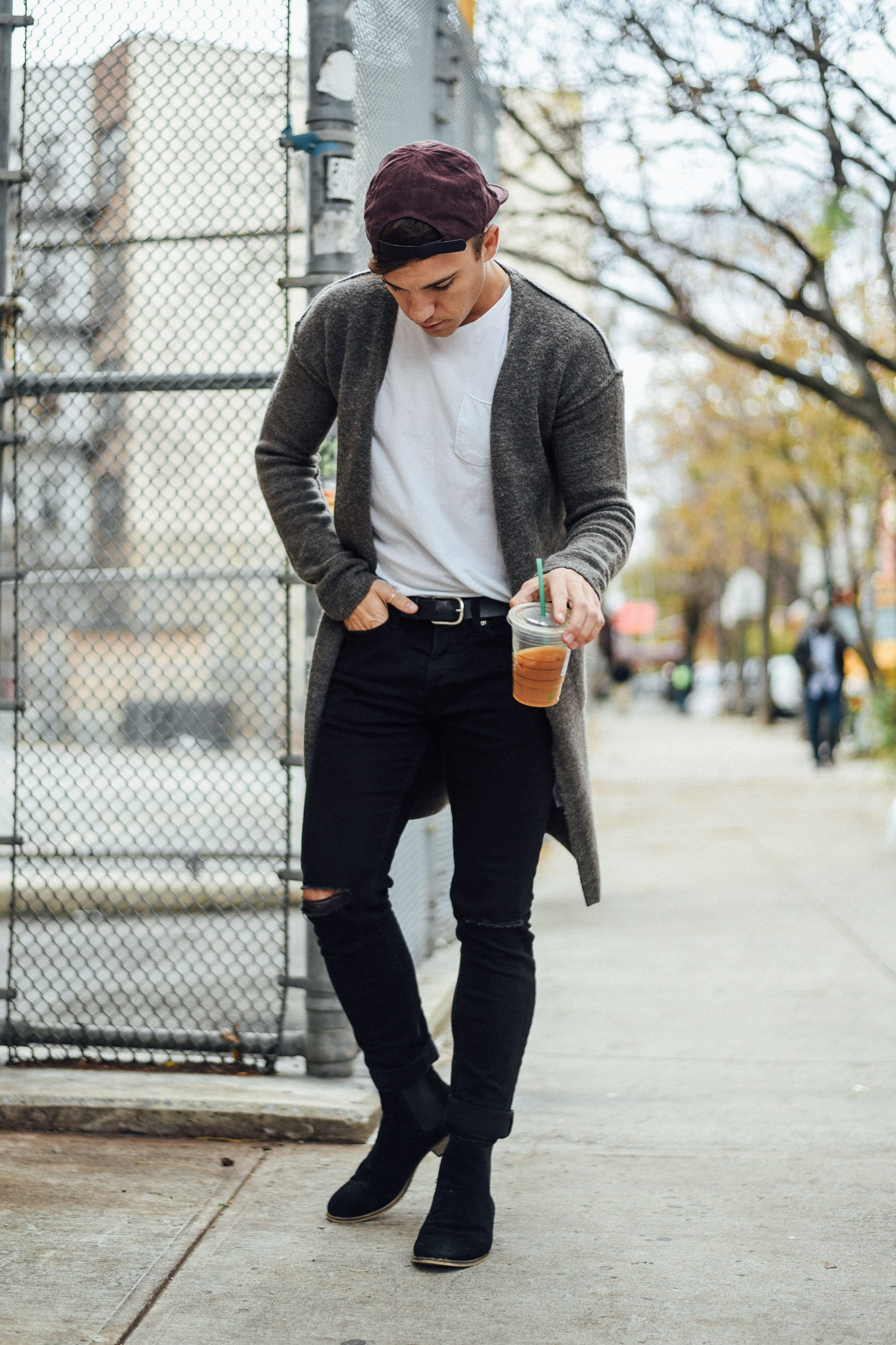 Men's Fashion Blogger Justin Livingston wears Topman Jacket Distressed Denim Black Chelsea Boots in New York City