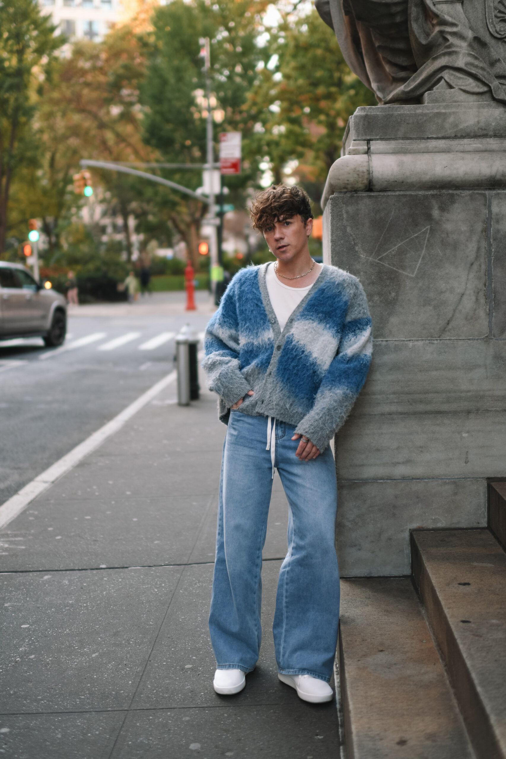 Scout Sixteen - Justin Livingston. Zara Blue Graphic Sweater. Amazon Fashion Blue Jeans. Atoms White Sneakers.