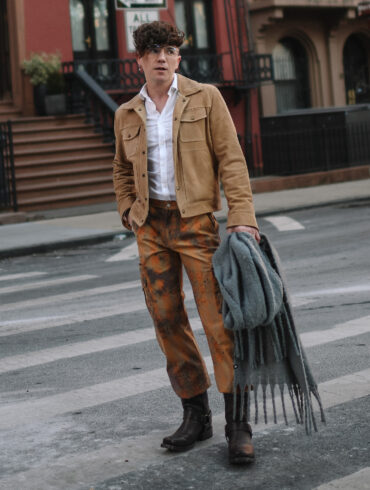 Scout Sixteen - Justin Livingston wears camouflage cargo pants with a men's camel suede jacket from Banana Republic and brown Stetson Heritage Harness Western Boots. NYC Men's Winter Style.