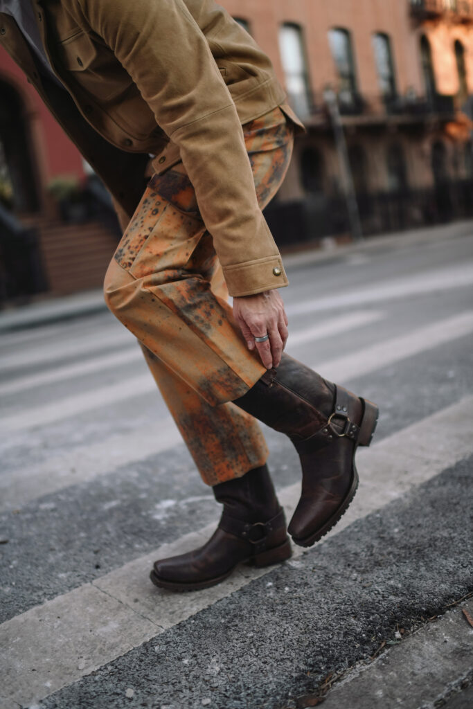 Scout Sixteen - Justin Livingston wears camouflage cargo pants with a men's camel suede jacket from Banana Republic and brown Stetson Heritage Harness Western Boots. NYC Men's Winter Style.