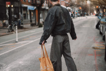 Scout Sixteen - Justin Livingston. Men's Fashion. Yeezy Denim Jacket, Ultra Wide Leg Jeans, Black Henley Tee, Bottega Veneta Black Boots