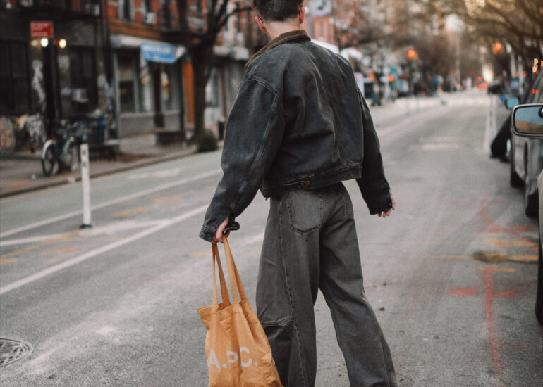 Scout Sixteen - Justin Livingston. Men's Fashion. Yeezy Denim Jacket, Ultra Wide Leg Jeans, Black Henley Tee, Bottega Veneta Black Boots