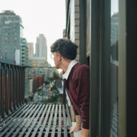 Scout Sixteen / Justin Livingston (justinliv) NYC Men's Fashion Inspiration - Maroon Men's Rugby Shirt Tommy Hilfiger, Men's Striped Blue Jeans Pants, Men's White Leather Sneakers Thursday Boots, New York City Skyline