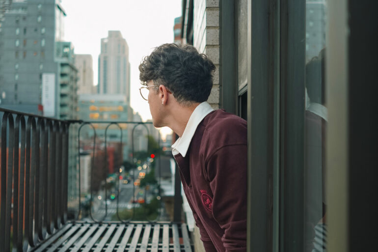 Scout Sixteen / Justin Livingston (justinliv) NYC Men's Fashion Inspiration - Maroon Men's Rugby Shirt Tommy Hilfiger, Men's Striped Blue Jeans Pants, Men's White Leather Sneakers Thursday Boots, New York City Skyline